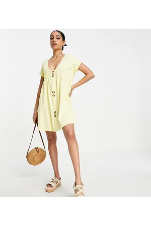 ASOS ASOS DESIGN Petite short sleeve mini smock dress with large button detail in lemon