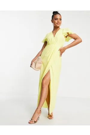TFNC Bridesmaid chiffon wrap front maxi dress with flutter sleeve in lemon