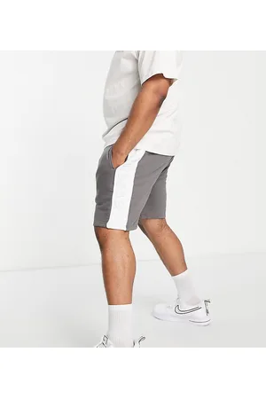 Ellesse Plus colour blocked short with logo in