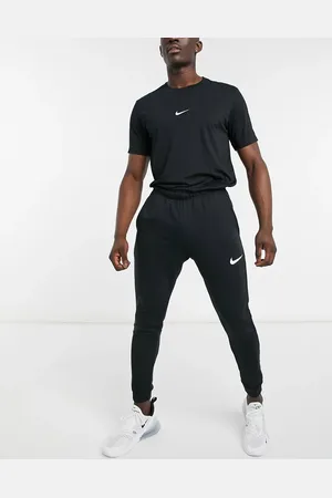 Nike Dri-FIT tapered fleece joggers in