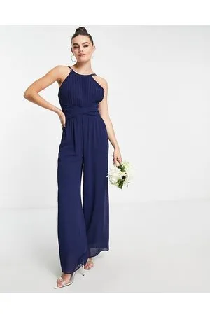 TFNC Bridesmaid pleated halter neck wide leg jumpsuit in