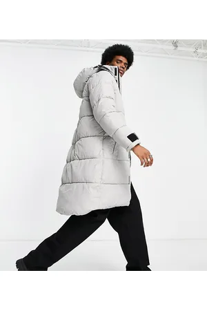 ADPT. Long puffer jacket with hood in