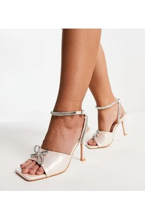 Public Desire Exclusive Front Row bow sandals in pearlescent pink