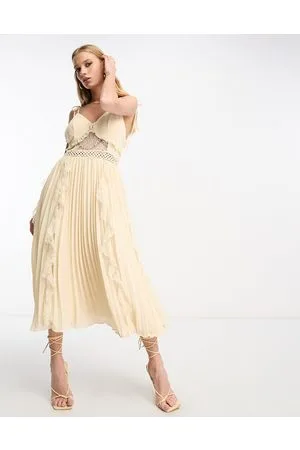 True Decadence Sheer dress with ruffles and lace in ecru