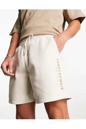 Abercrombie & Fitch Embroidered logo drawstring shorts in beige