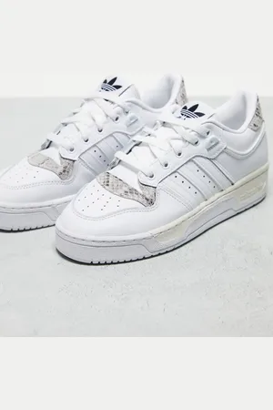 adidas Rivalry trainers in and snake print