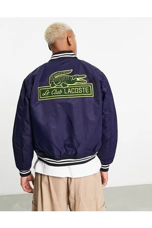 Lacoste Varsity jacket in with patches and back print