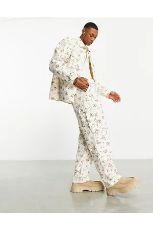 Huf Co-ord utility cargo trousers in with all over floral print