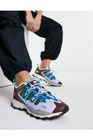 adidas Hyperturf trainers in and green multi