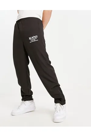 Karl Kani Retro straight leg trousers in with zip hem detail