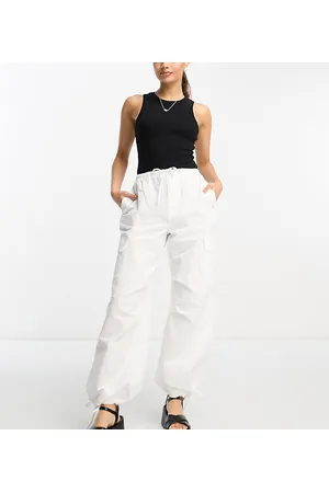 Bershka Petite tie waist nylon cargo parachute trousers in