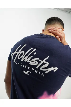 Hollister Chest & back logo acid wash ombre longline t-shirt in blue