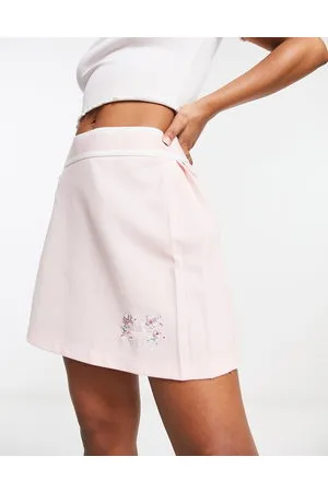 adidas Pleated skirt in pastel with floral logo