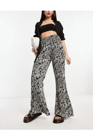 Urban Threads Plisse trousers in abstract animal print