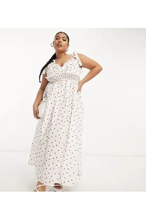 ASOS ASOS DESIGN Curve bow bust shirred waist midi sundress in brown polka dot