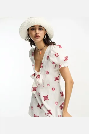 Reclaimed Broderie cutwork playsuit with tie front and open back in white