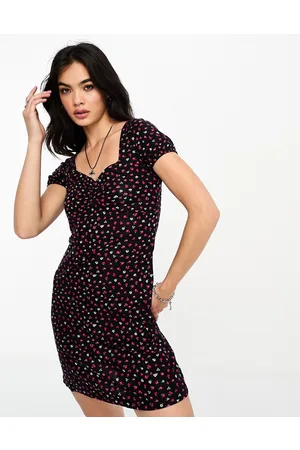 ONLY Cross back detail mini dress in black and red ditsy floral