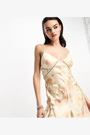Reclaimed Satin playsuit in floral print