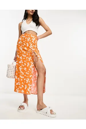 ASOS Bow detail midi skirt with thigh split in ditsy floral