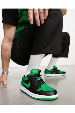 Jordan AJ 1 Low trainers in green and