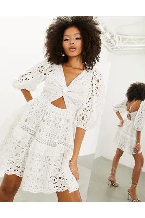 ASOS Broderie twist front mini dress with puff sleeve in
