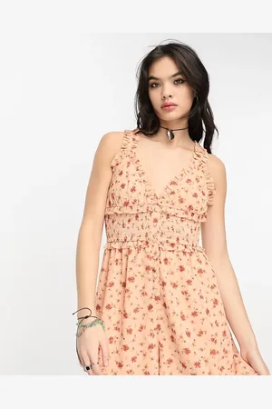 Reclaimed Playsuit with shirring in ditsy floral print