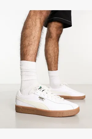 PUMA Delphin trainers in with gum sole