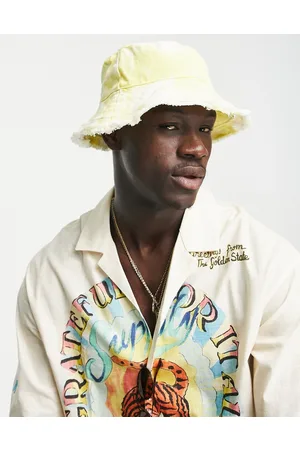 ASOS Bucket hat in washed lemon with raw edge
