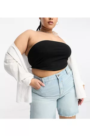 ASOS ASOS DESIGN Curve denim bermuda shorts with distressed hem in lightwash