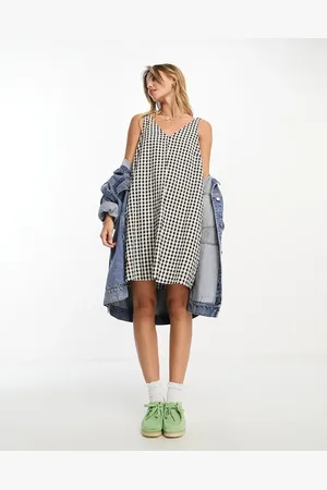 Monki Seersucker bow tie strap mini dress with side pockets in black and white gingham