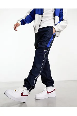 Nike Swoosh Air woven joggers in