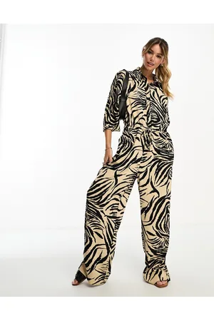 Monki Loose fit jumpsuit in beige zebra print