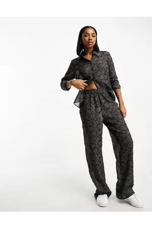 Monki Textured floral print trousers in dark grey