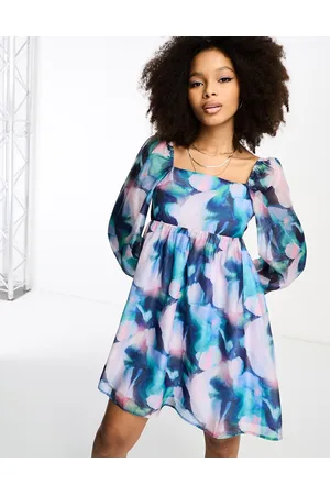 Glamorous Puff sleeve mini smock dress with bow back in blue floral organza
