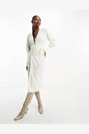 In The Style Exclusive knitted wrap midi jumper dress in cream