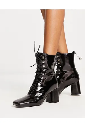 Moschino Lace up boots with zip back in