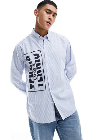 Lacoste Heritage logo long sleeve shirt in white and blue