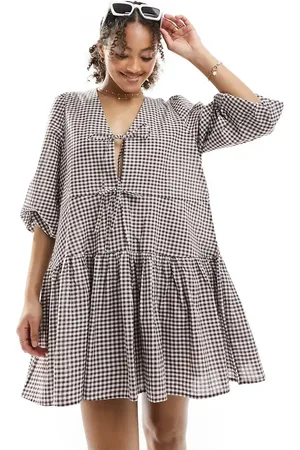 Esmée Esmee beach tiered smock mini dress with tie front detail in dark gingham