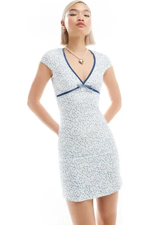 Glamorous V neck short sleeve mini dress in vintage blue ditsy and velvet ribbon trim