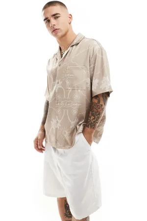 The Couture Club Palm print embroidery shirt in beige