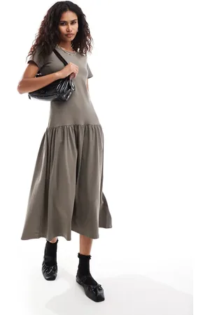Monki Short sleeve open neck midi soft jersey dress with dropped waist in