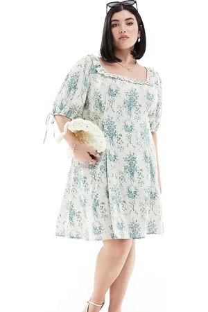 ASOS ASOS DESIGN Curve frill neck puff sleeve mini dress in blue floral print