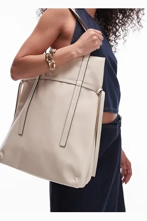 Topshop Tucker tote bag with strap detail in off