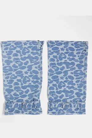 A Bathing Ape Aape by A Bathing Ape denim leg warmers in