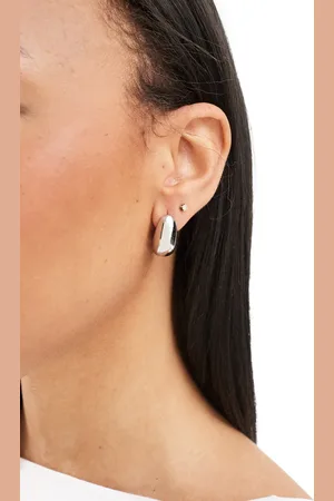 LOST SOULS Stainless steel dome stud earrings in