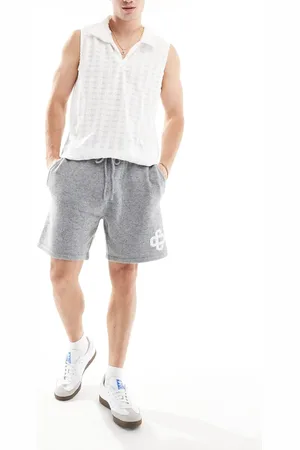 The Couture Club Emblem knitted shorts in
