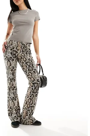 Noisy May High waisted flared trousers in snake print