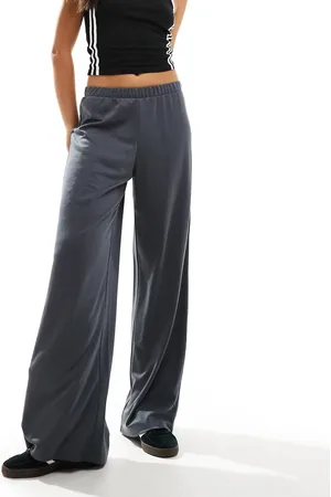 Monki Super soft low waist wide leg jersey trousers in dark