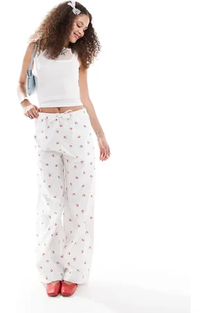 Monki Pull on drawstring waist wide leg trousers in cherry print