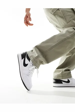 Jordan Air 1 low trainers in and black